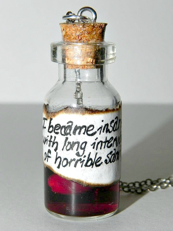 poe_insanity_human_heart_necklaces_6.jpg