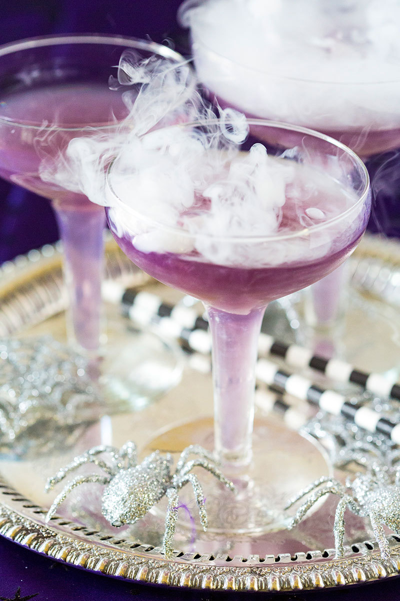 Dry ice Halloween cocktail: Violet witches brew