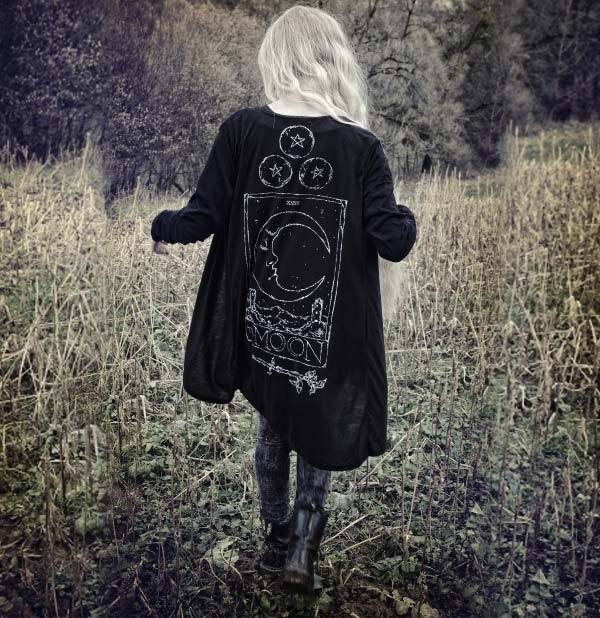 Witchy gothic outfit with occult themed cardigan